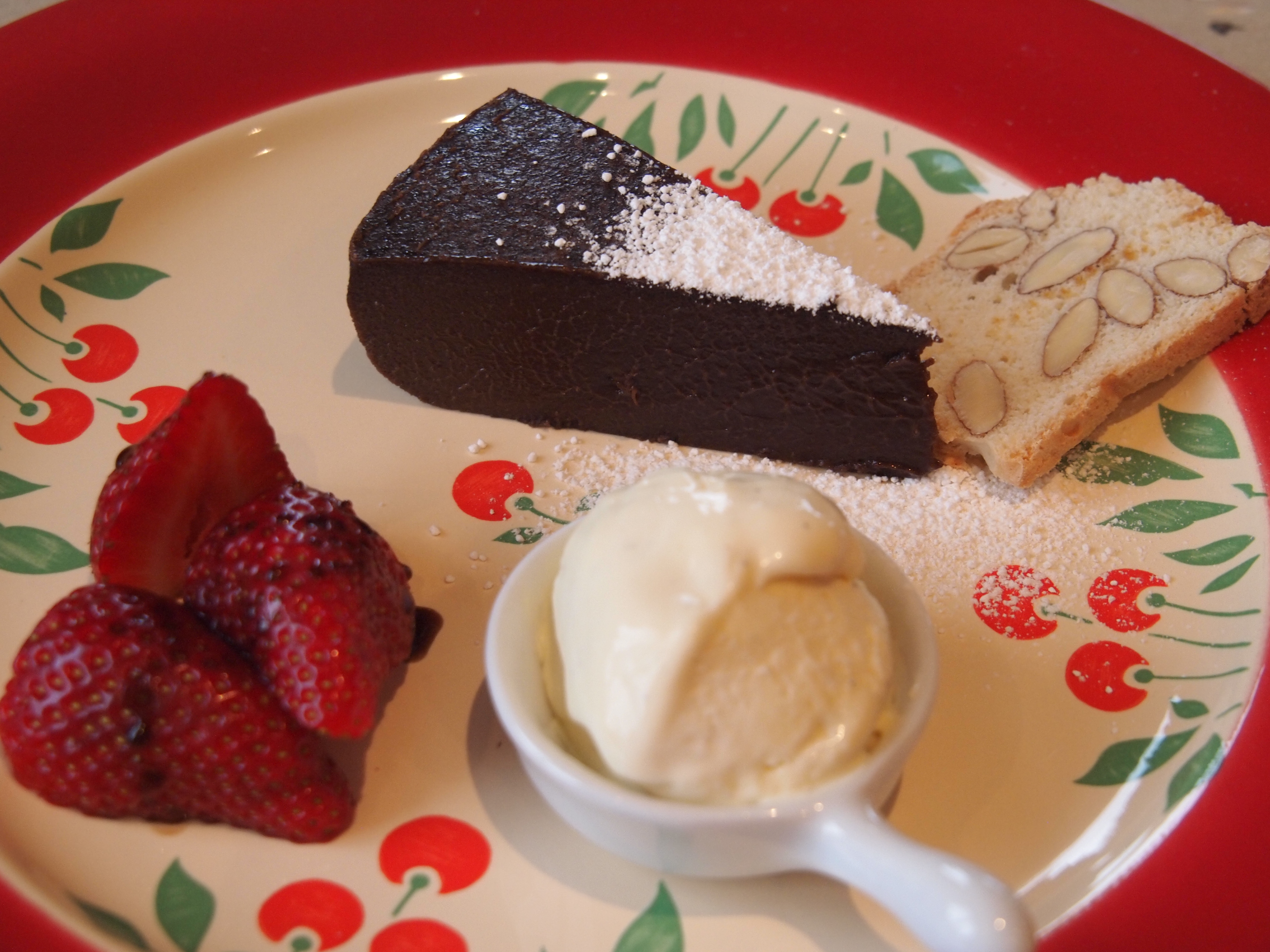 Chocolate delice with almond biscotti and our vanilla bean  ice cream   a taste of melbourne   modern australian cuisine